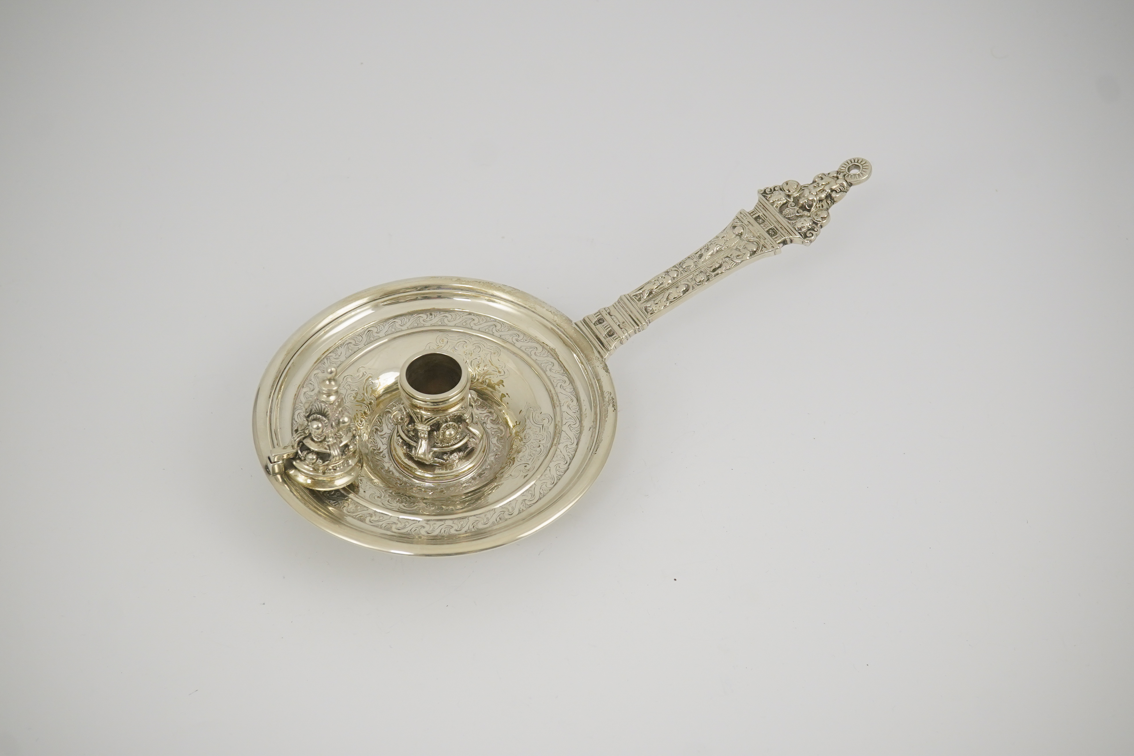 An ornate Victorian silver Renaissance revival chamber stick, by George Fox